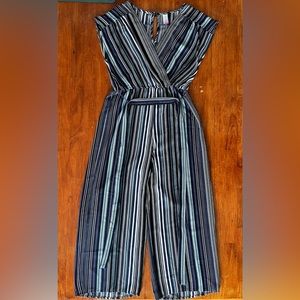 ‘No Boundaries’ multicolored jumpsuit with tie/wraparound.